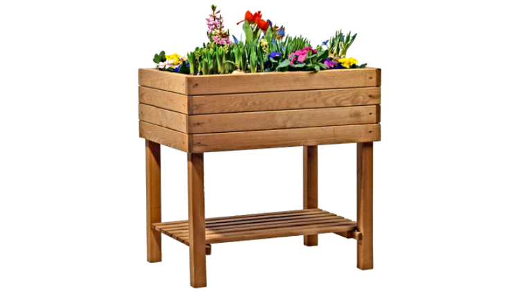 Ein Hochbeet aus Holz auf vier Beinen mit bunten Blumen und einer Ablagefläche unten.