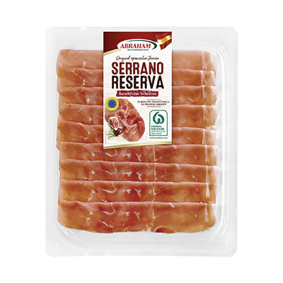 Verpackung mit dünn geschnittenem Serrano-Schinken der Marke Abraham, Etikettaufschrift „Serrano Reserva, Rinde ohne“.