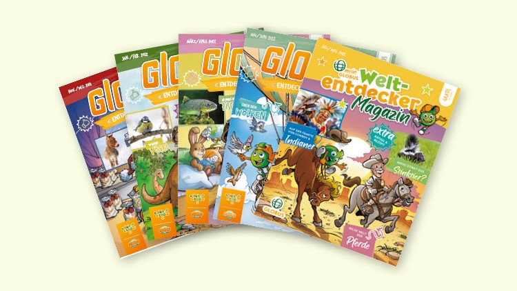 Sechs Ausgaben des GLOBUS-Weltentdecker-Magazins in bunten Farben fächern sich auf hellem Untergrund auf.