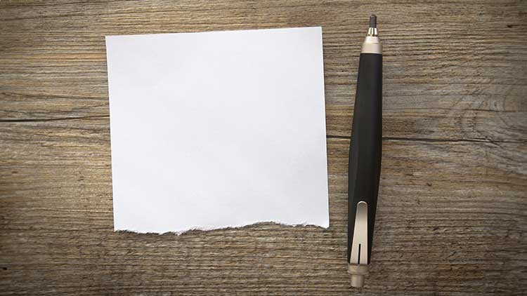 Notizzettel und Stift