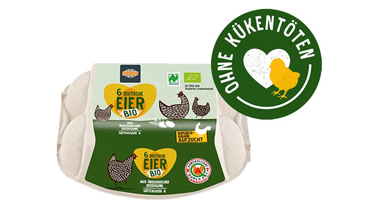 Verpackung mit 6 deutschen Bio-Eiern, Siegel „Ohne Kükentöten“, Grafik mit Herz und Küken sowie Angaben zur Bruderhahn-Aufzucht.