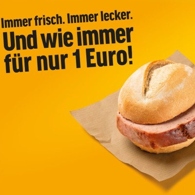 Gelbes Plakat mit Text „Immer frisch, Immer lecker, Und wie immer für nur 1 Euro!“ und Logo GLOBUS Fachmetzgerei.