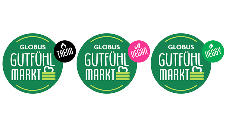 Drei grüne GLOBUS Gutfühl-Markt-Logos mit den Zusatzmarkierungen TREND in Schwarz, VEGAN in Pink und VEGGY in Grün.
