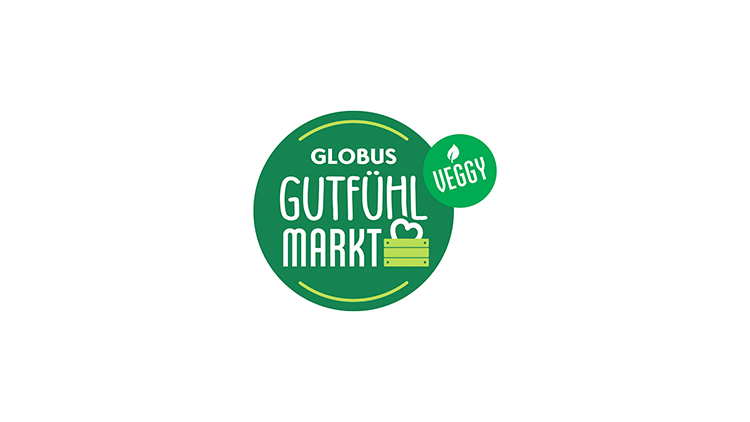 Grünes rundes Logo mit Schriftzug „GLOBUS Gutfühl-Markt“, kleiner grüne Kreis rechts mit Schrift „Veggy“ und Blatt-Symbol.