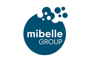 Logo der Mibelle Group, weißer Schriftzug und Bläschen auf dunkelblauem kreisförmigem Hintergrund.