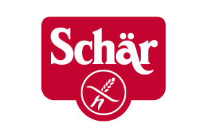 Weißer Schriftzug „Schär“ auf rotem Hintergrund, darunter ein Kreis mit einem Ährenmotiv und einem „n“.