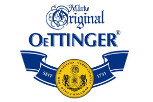 Das Logo zeigt den Schriftzug „Marke Original OeTTINGER“, blaue Banner, einen goldenen Kreis mit Wappen und die Jahreszahl 1731.