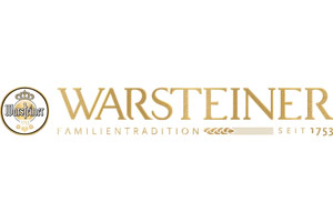 Warsteiner-Logo mit Krone, Schriftzug „Warsteiner“, Slogan „Familientradition“ und Jahreszahl „seit 1753“ in Gold und Beige.