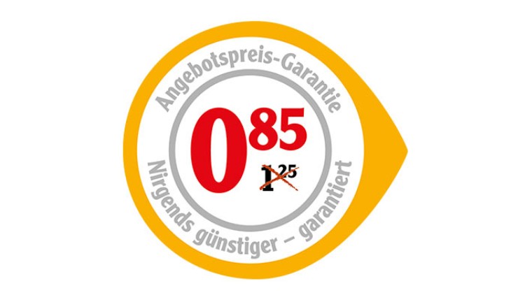 Rundes Symbol mit gelbem Rand, Text „Angebotspreis-Garantie, Nirgends günstiger – garantiert“, Zahl „0,85“ in Rot, durchgestrichen „1,25“.