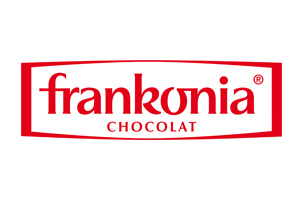 Logo mit rotem Schriftzug „frankonia CHOCOLAT“ auf weißem Hintergrund, umgeben von einem roten rechteckigen Rahmen.