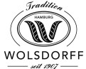 Schwarzes Logo mit der Aufschrift „Tradition WOLSDORFF seit 1907“ und dem Wort „HAMBURG“ in einem ovalen Rahmen.