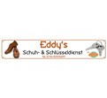 Logo mit der Aufschrift „Eddy's Schuh- & Schlüsseldienst“, braune Schuhe links, Schlüssel rechts, Globini-Logo unten rechts.