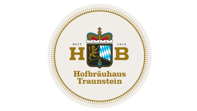 Das runde Logo zeigt „Hofbräuhaus Traunstein“, ein Wappen mit bayerischem Rautenmuster, Krone, Löwe und der Jahreszahl „1612“.