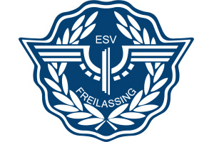 Blaues Wappen mit weißen Flügeln, Schriftzug „ESV Freilassing“ und Lorbeerkranz um ein zentrales Symbol.