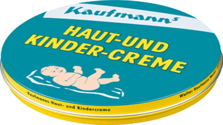 Runde Dose in Gelb und Türkis mit der Aufschrift Kaufmanns Haut-und Kinder-Creme und einer Babyzeichnung.