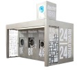 Silberne SB-Waschstation mit Texten wie „Waschen 18 KG“, „24 REVOLUTION“, „8 €“, „4 €“ und ikonischen Wäschegrafiken.