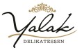 Schwarzer Schriftzug „Yalak“ mit goldener Verzierung darüber und schwarzer Unterzeile „DELIKATESSEN“ auf weißem Hintergrund.