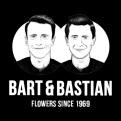 Schwarz-weißes Logo mit zwei gezeichneten Köpfen und dem Text „BART & BASTIAN“ sowie „FLOWERS SINCE 1969“ darunter.
