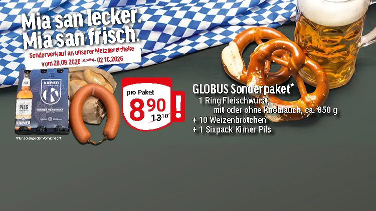 Ein Maß Bier, Brezeln, Fleischwurst, Brötchen und ein Kasten Kirner Pils vor blau-weißer Tischdecke, Text „Mia san lecker, mia san frisch“.