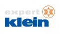 Das Bild zeigt das Logo von „expert klein“, mit „expert“ in Grau, „klein“ in Blau und einem orange-weißen Stern rechts oben.