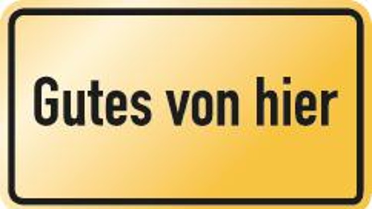 Rechteckiges gelbes Schild mit dem schwarzen Schriftzug Gutes von hier in serifenloser Schrift.